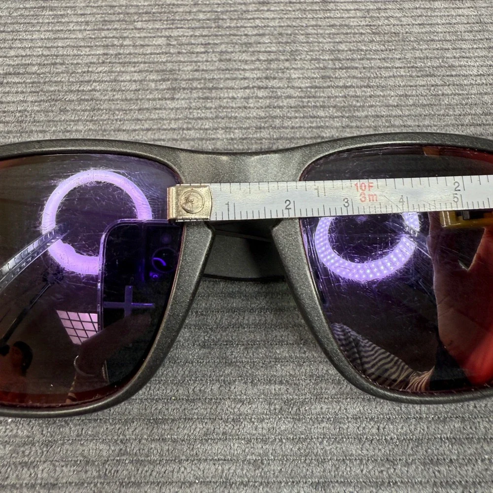Oakley Black Frame Sunglasses with Purple-Red Mirrored Lenses